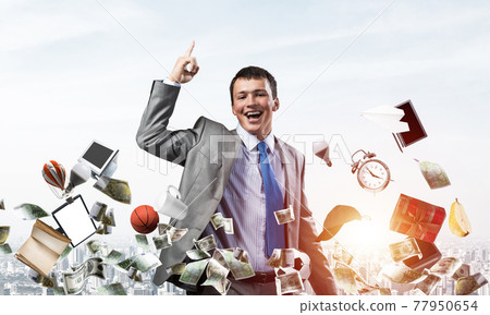 Businessman and falling from sky various goods Businessman and falling from sky various goods 77950654