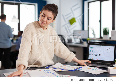 Financial charts analysed in start up company by business owner 77951220