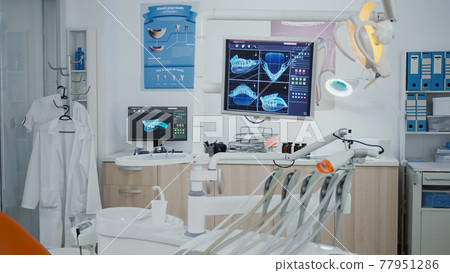 Close up revealing shot medical dentistry display with teeth diagnosis xray Close up revealing shot medical dentistry display with teeth diagnosis xray 77951286