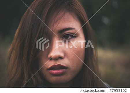Portrait of young beautiful smile woman in sunset. Vintage filter style. Happy woman in field, Portrait of young beautiful smile woman in sunset. Vintage filter style. Happy woman in field, 77953102