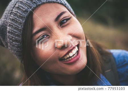 Portrait of young beautiful smile woman in sunset. Vintage filter style. Happy woman in field, Portrait of young beautiful smile woman in sunset. Vintage filter style. Happy woman in field, 77953103