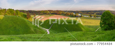 Lithuanian historic capital Kernave, green landscape of Kernave mounds 77954484