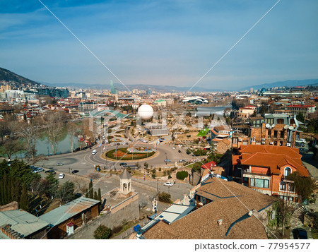 aerial photo. City landscape of Tbilisi and the Kura river aerial photo. City landscape of Tbilisi and the Kura river 77954577