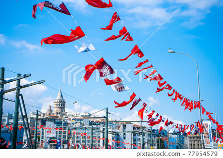 Flags of Turkey are hung over the streets of Istanbul. Political elections in Turkey 77954579