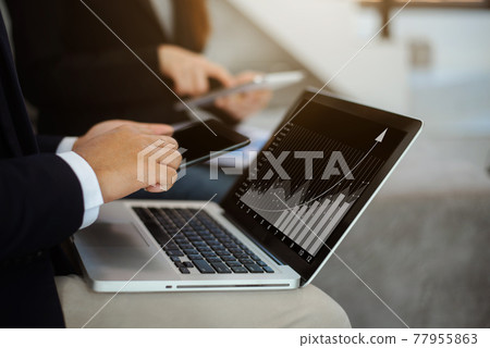 Businessman and stock market or forex graph suitable for financial investment concept. Economy trends background for business in office. Businessman and stock market or forex graph suitable for financial investment concept. Economy trends background for business in office. 77955863