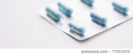 Blue pills and capsules as nutrition supplement, wellness and health care Blue pills and capsules as nutrition supplement, wellness and health care 77955870