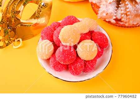 Baked castagnole. Traditional sweet pastries during the carnival period in italy. Street food, round 77960482