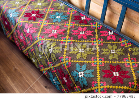 A shop at a house in a village with an embroidered shirt made of traditional patterns, handmade A shop at a house in a village with an embroidered shirt made of traditional patterns, handmade 77965485