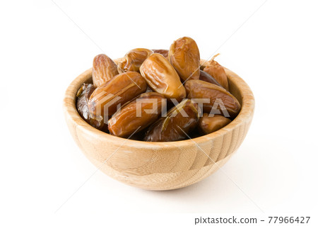 Dates isolated on white background Dates isolated on white background 77966427