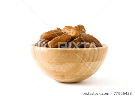 Dates isolated on white background Dates isolated on white background 77966428