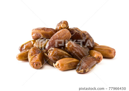 Dates isolated on white background Dates isolated on white background 77966430