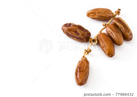 Dates isolated on white background Dates isolated on white background 77966432