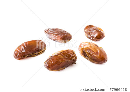 Dates isolated on white background Dates isolated on white background 77966438
