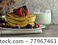 Pancakes, side view. 77967461
