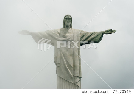 The Christ the Redeemer statue a top the Corcovado Mountain in Rio de Janeiro, Brazil. The Christ the Redeemer statue a top the Corcovado Mountain in Rio de Janeiro, Brazil. 77970549