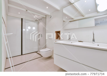Home interior of restroom with toilet Home interior of restroom with toilet 77971734