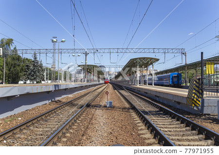 Train on Moscow passenger platform (Belorussky railway station) is one of the nine main railway stations in Moscow, Russia 77971955