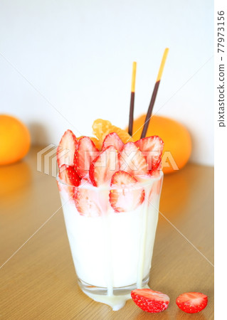Panna cotta full of dessert strawberries Panna cotta full of dessert strawberries 77973156