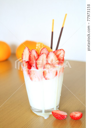 Panna cotta full of dessert strawberries Panna cotta full of dessert strawberries 77973158