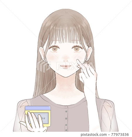 A woman who applies vaseline to her face to moisturize A woman who applies vaseline to her face to moisturize 77973836
