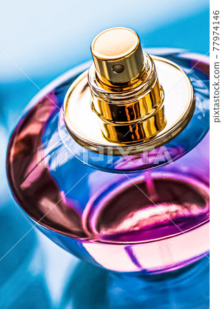 Perfume bottle on glossy background, sweet floral scent, glamour fragrance and eau de parfum as holiday gift and luxury beauty cosmetics brand design Perfume bottle on glossy background, sweet floral scent, glamour fragrance and eau de parfum as holiday gift and luxury beauty cosmetics brand design 77974146