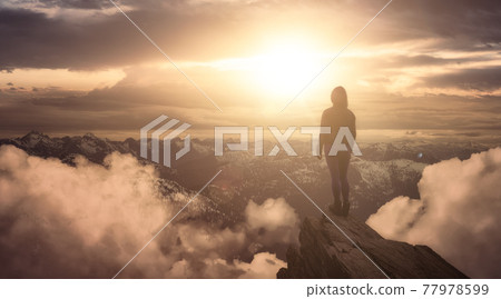 Fantasy Adventure Composite with a Woman on top of a Mountain Cliff Fantasy Adventure Composite with a Woman on top of a Mountain Cliff 77978599