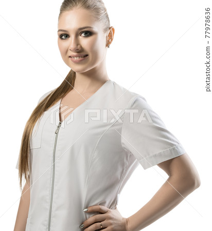 Pretty nurse in white uniform cropped view Pretty nurse in white uniform cropped view 77978636