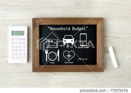 Blackboard frame and calculator with pictograms of living expenses items Blackboard frame and calculator with pictograms of living expenses items 77979356