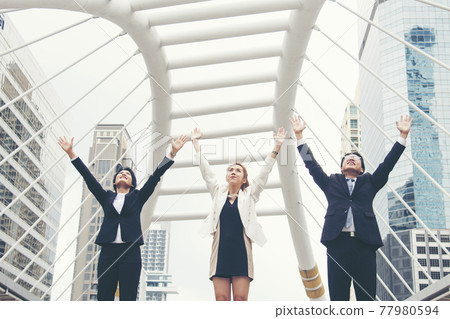 Teamwork Together Concept. Group of diversity people high five on air to greeting power of tag team. Multiethnic people group working togetherness. Volunteer collaboration in Business Team success Teamwork Together Concept. Group of diversity people high five on air to greeting power of tag team. Multiethnic people group working togetherness. Volunteer collaboration in Business Team success 77980594