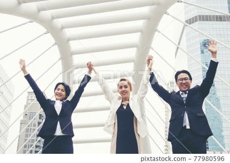 Teamwork Together Concept. Group of diversity people high five on air to greeting power of tag team. Multiethnic people group working togetherness. Volunteer collaboration in Business Team success Teamwork Together Concept. Group of diversity people high five on air to greeting power of tag team. Multiethnic people group working togetherness. Volunteer collaboration in Business Team success 77980596