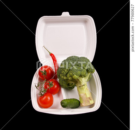 Closeup view of vegetables isolated on black and white background Closeup view of vegetables isolated on black and white background 77980627