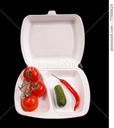 Closeup view of vegetables isolated on black and white background Closeup view of vegetables isolated on black and white background 77980629