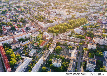 Aerial view of city residential district at sunset 77983837