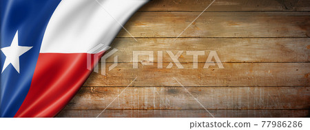 Texas flag on old wood wall banner, USA 77986286