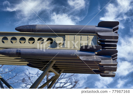 Fragment of the Katyusha rocket artelerik complex against the sky Fragment of the Katyusha rocket artelerik complex against the sky 77987168