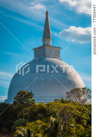 Mahaseya Dagoba Buddhist stupe in Mihintale, Sri Lanka, on sunset 77988447