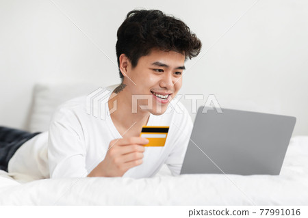 Online shopping at home, ordering goods in modern store, covid-19 lockdown 77991016