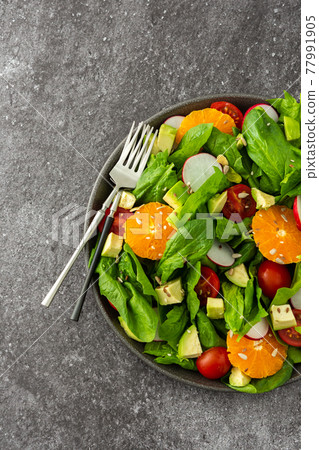 Delicious healthy salad with vegetables Delicious healthy salad with vegetables 77991905