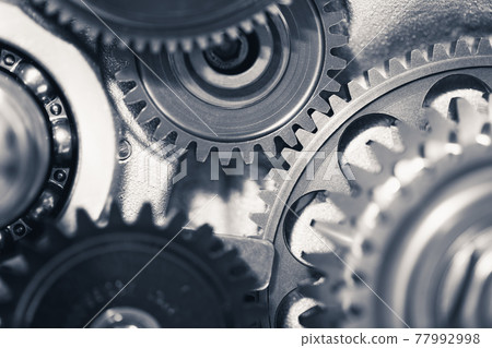 engine gear wheels, industrial background engine gear wheels, industrial background 77992998