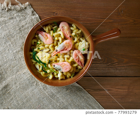 Fideua seafood dish. 77993279