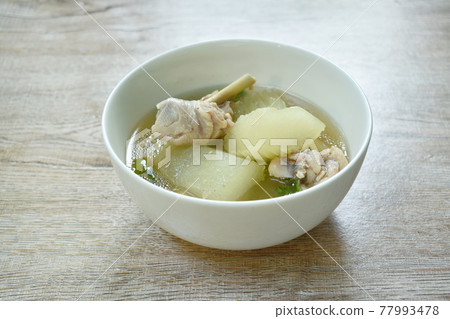 boiled winter melon with chicken leg soup on bowl boiled winter melon with chicken leg soup on bowl 77993478