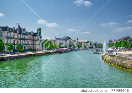 Canal in the city 77994448