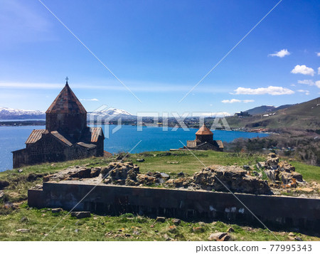Armenian monastery of Sevanavank at lake Sevan in spring Armenian monastery of Sevanavank at lake Sevan in spring 77995343