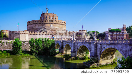 Sant'Angelo Bridge leading to Castel Sant'Angelo, Rome on a sunny day Sant'Angelo Bridge leading to Castel Sant'Angelo, Rome on a sunny day 77995799