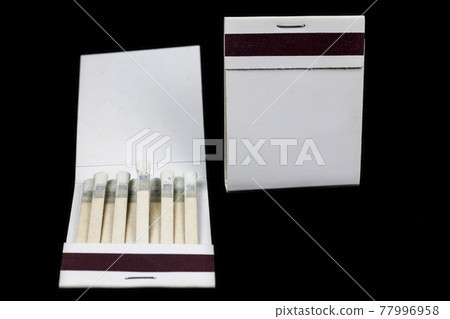 Matchbook on a black background Matchbook on a black background 77996958