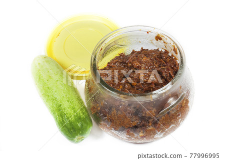 chili sauce made from pickled fish And cucumber. chili sauce made from pickled fish And cucumber. 77996995