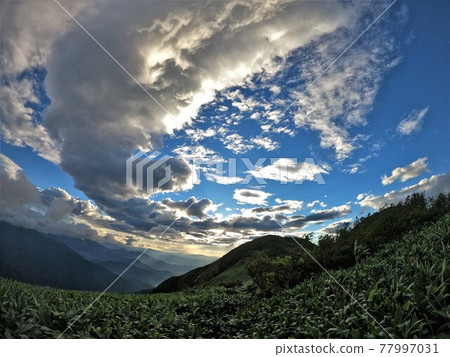 Typhoon clouds over Mt. Nakanodake Typhoon clouds over Mt. Nakanodake 77997031