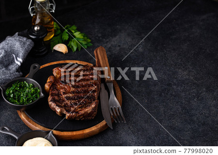 Grilled marbled rib eye steak 77998020