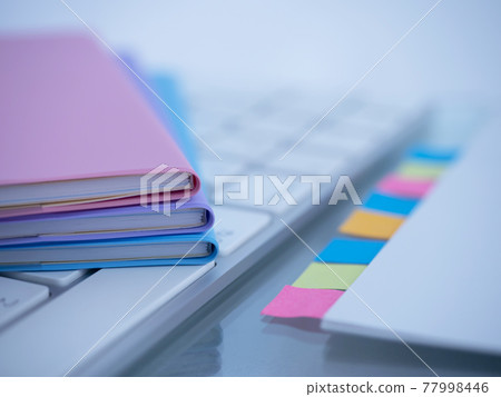 Business image · document · keyboard · notebook · woman 77998446