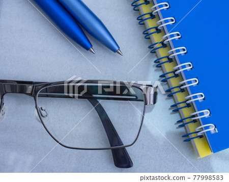 Business image · glasses · notebook Business image · glasses · notebook 77998583